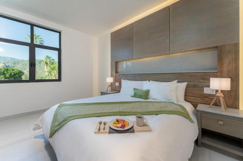 Ένα ή περισσότερα κρεβάτια σε δωμάτιο στο Hotel Cordelia Resort & Spa