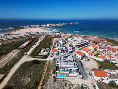 an aerial view of a town next to the ocean at Beach & Surf Lovers Apartment with AC - Baleal in Baleal