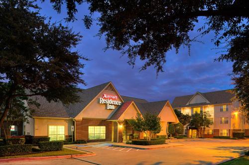 a hotel with a sign that reads inn reception line at Residence Inn Arlington in Arlington