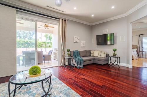 a living room with a couch and a table at Regal 4 bed with hot tub close to Universal sleeps 15 in Los Angeles