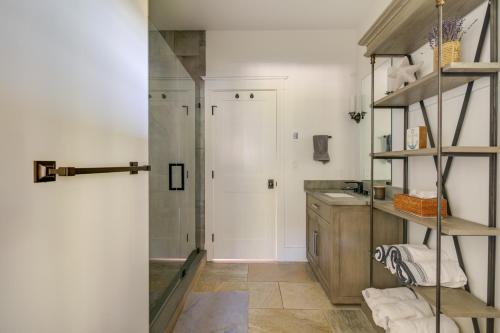 a bathroom with a shower and a sink at Luxe Scituate Vacation Rental with Private Hot Tub! in Scituate