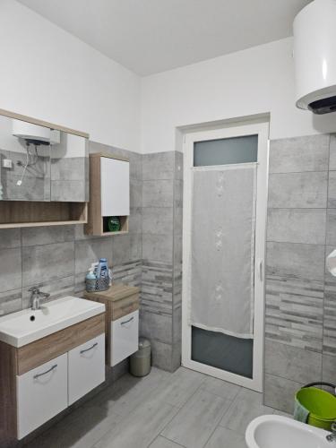 Ein Badezimmer in der Unterkunft AL PALU'