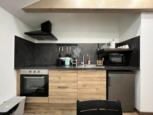 Η κουζίνα ή μικρή κουζίνα στο Serenity Home Hayange