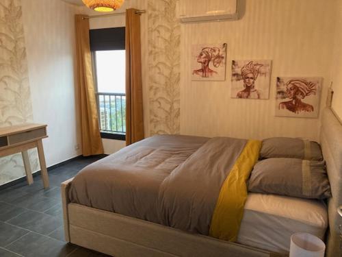 Postel nebo postele na pokoji v ubytování Résidence Le Panorama 1