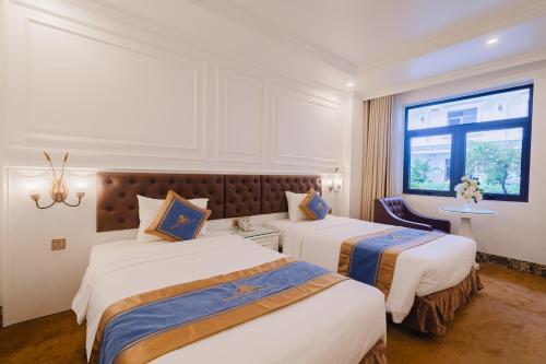 Katil atau katil-katil dalam bilik di GRAND VIEW PALACE HA LONG HOTEL