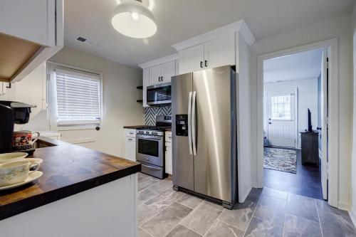 a kitchen with a stainless steel refrigerator at 5 min Grant park with Fenced Yard Parking Pet Friendly in Atlanta