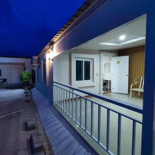 a view of a balcony of a house at SUKANO Apartment VIP in Ban Thap Nang