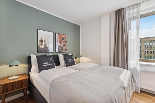 Katil atau katil-katil dalam bilik di Limehome Oberhausen Paul-Reusch-Str