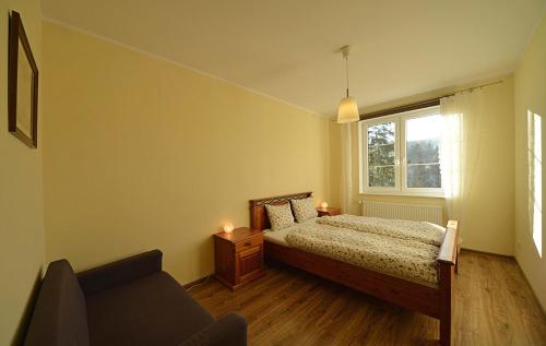 Postel nebo postele na pokoji v ubytování Villa Avangarda