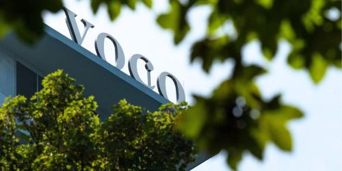 a close up of a sign on top of a building at voco Brussels City North by IHG in Vilvoorde