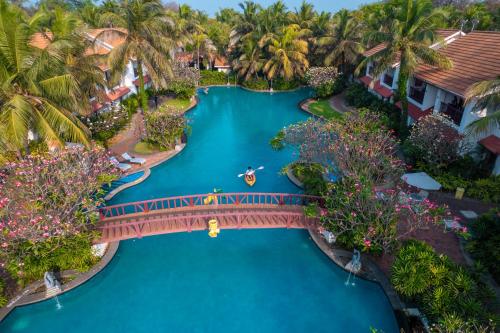 an aerial view of a bridge over the water at a resort at Radisson Blu Resort Temple Bay Mamallapuram in Mahabalipuram