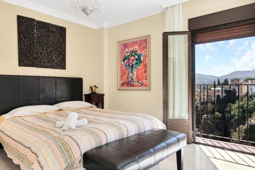 Postel nebo postele na pokoji v ubytování La Jaula de Oro