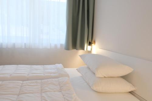 Letto o letti in una camera di Cèsa Sot Bosch