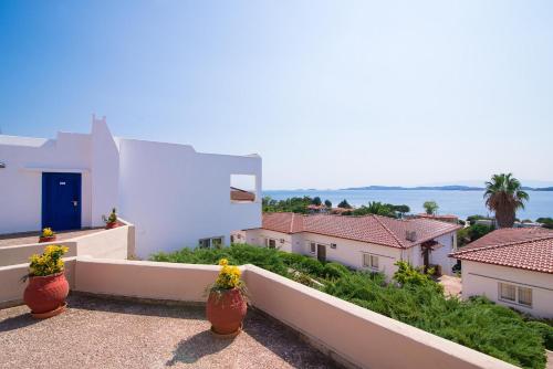 a view from the balcony of a house at Alexandros Palace in Ouranoupoli