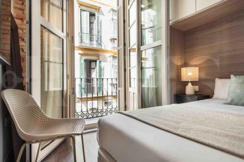 Ένα ή περισσότερα κρεβάτια σε δωμάτιο στο Eclectic & elegant apartment by REMS