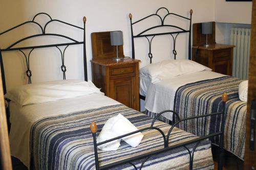 Ένα ή περισσότερα κρεβάτια σε δωμάτιο στο Ribo Apartments