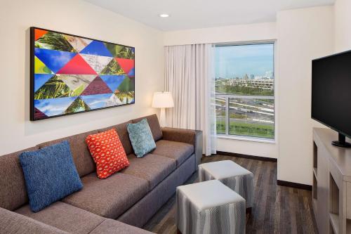 Télévision ou salle de divertissement dans l'établissement Hyatt House across from Universal Orlando Resort