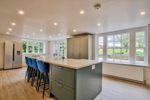 A kitchen or kitchenette at Abbey House by Group Retreats