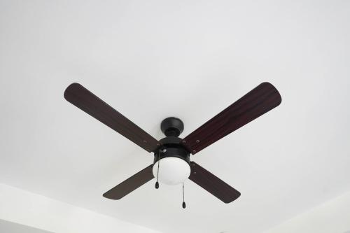 a ceiling fan hanging from a ceiling at Luxurious Place Mountain View Spacious with WIFI Near SM Lucena in Lucena