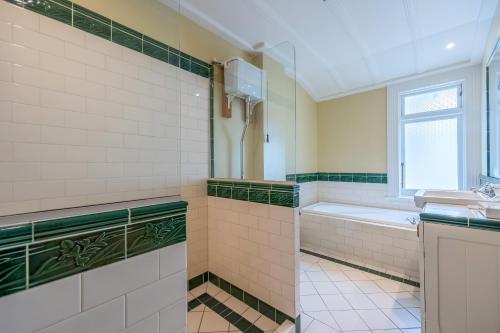 Postel nebo postele na pokoji v ubytování Aachen House