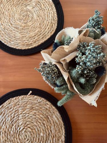 a group of baskets sitting on top of a table at Tyche House Castelmola in Castelmola