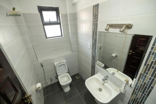Koupelna v ubytování Hotel Lourdes, Siaya