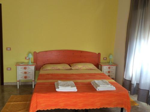 Una cama o camas en una habitación de B&B Da Francesca