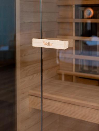 a sign on a glass door with the word walls at Zala Springs Golf Resort in Zalacsány