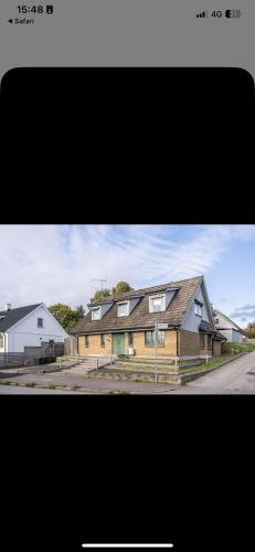 a group of houses are shown in two photographs at Toarp Inn in Malmö