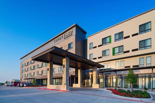 a rendering of the front of a hotel at Courtyard Dallas Grand Prairie in Grand Prairie