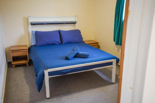 Ένα ή περισσότερα κρεβάτια σε δωμάτιο στο Kirkwall Youth Hostel