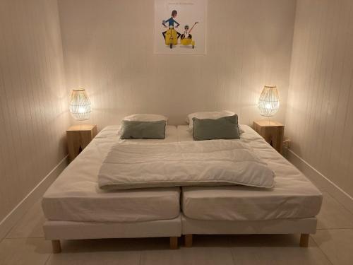 Кровать или кровати в номере l'Herbo' MAGNIFIQUE maison à 2 pas du porte de Pêche de l'Herbaudière
