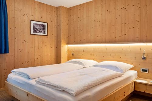 Ένα ή περισσότερα κρεβάτια σε δωμάτιο στο Stoffel Apartments Martina
