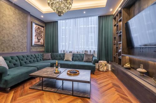 a living room with a couch and a tv at 34 Coney Street in York