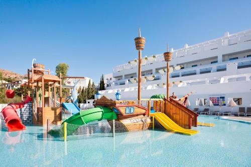 a pool with a water park on a cruise ship at Best Club Vacaciones Pueblo Indalo in Mojácar