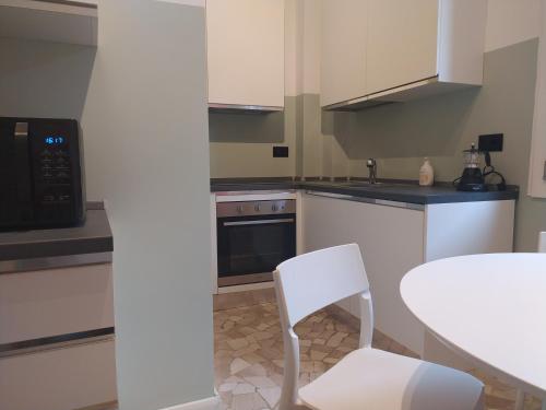 Kuchyň nebo kuchyňský kout v ubytování Everyday Apartments Corte Petroni