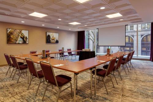 a conference room with a long table and chairs at Courtyard by Marriott Portland City Center in Portland