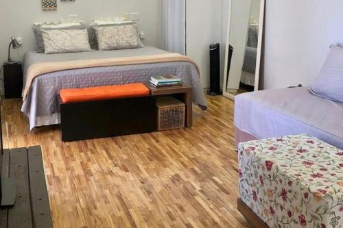 Cama ou camas em um quarto em Loft em Guaratinguetá - SP