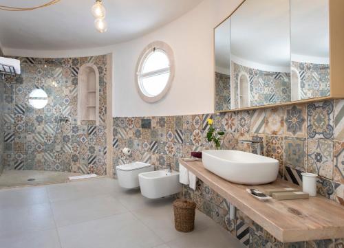 Ванная комната в Villa Escargot Luxury in Costa Rei Beach