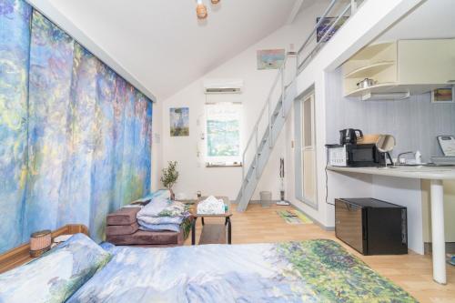 a bedroom with a large painting on the wall at Claude Monet Tokyo Shibuya Shinjyuku Wifi Free! in Tokyo