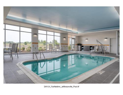 a pool in a hotel room with at Fairfield Inn & Suites by Marriott Jeffersonville I-71 in Jeffersonville