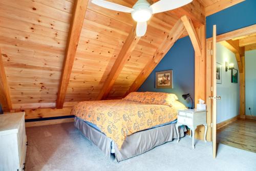 a bedroom with a bed and a ceiling fan at Chester Home with Views about 10 Mi to Okemo Mtn Resort! in Chester