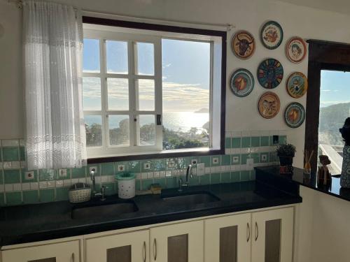 Køkken eller tekøkken på Alto João Fernandes