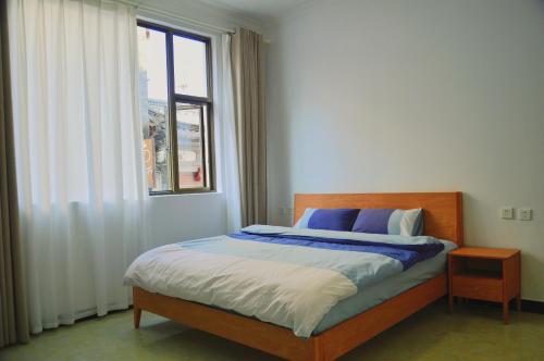 Postel nebo postele na pokoji v ubytování Monster B&B