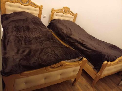 Una cama o camas en una habitación de Guest House 1