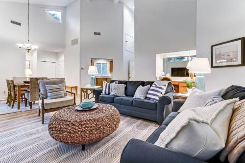 a living room with a couch and a table at 2349 Courtside Villas in Amelia Island