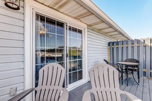 a patio with two chairs and a table on a house at 2810 Ohio Avenue #1 in Amelia Island