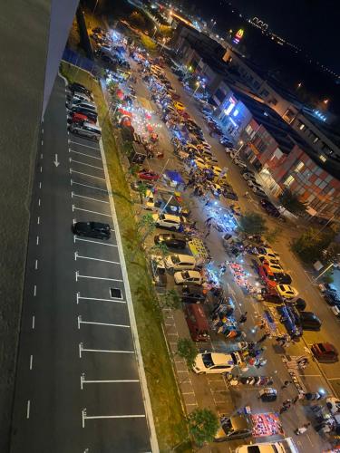an aerial view of a parking lot at a car show at Reylin Alanis Suite // Free Wifi & Netflix // Airport Shuttle Service in Sepang