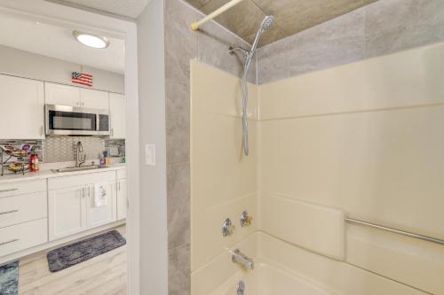 a bathroom with a shower and a sink at Pool Access 8th-Floor Condo on North Myrtle Beach in Myrtle Beach