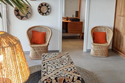 Χώρος καθιστικού στο 7 bedrooms Villa, Nestled in the heights of Anse Marcel, one of the most discreet bays of the island.